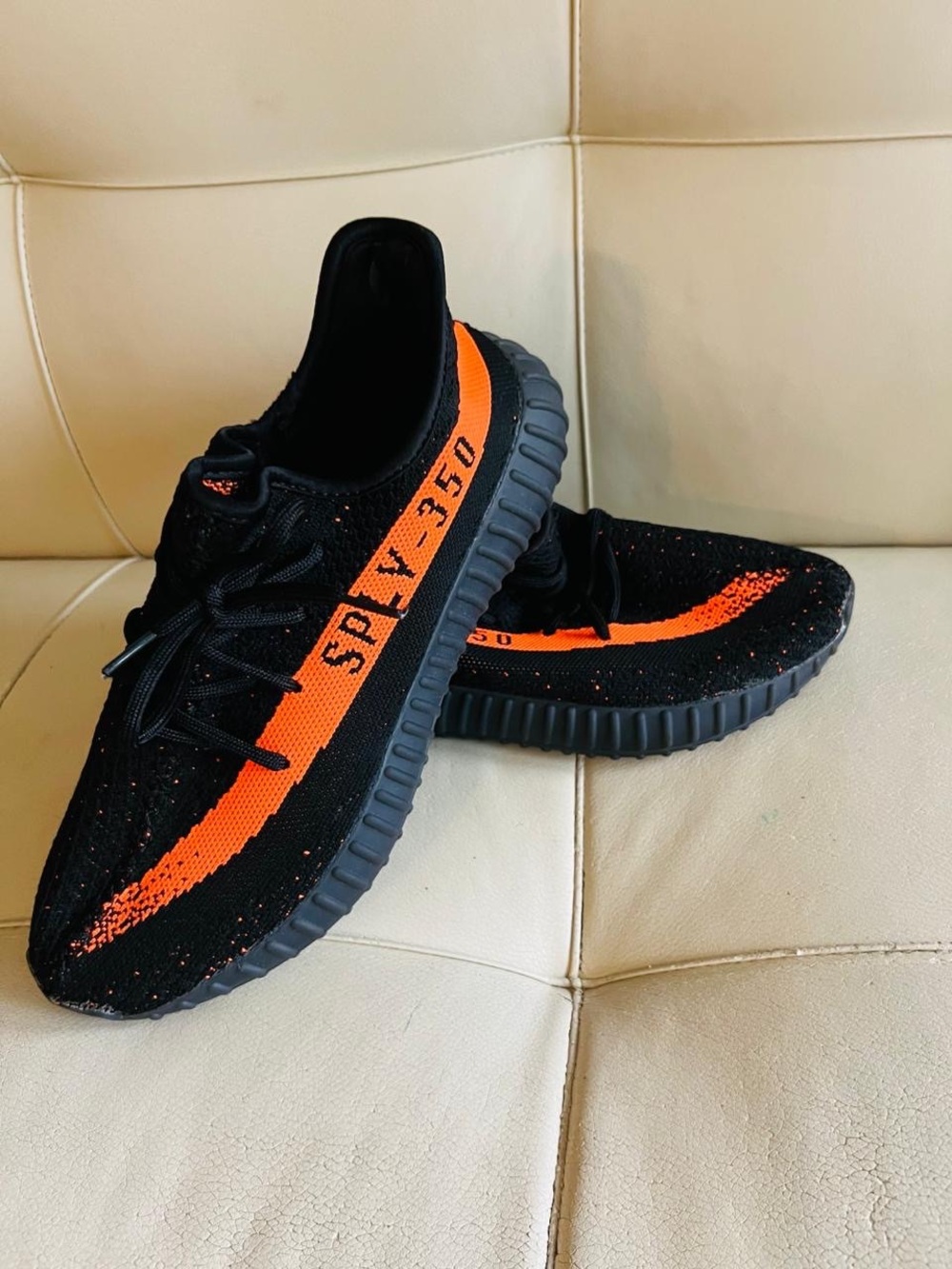 adidas Men’s Black Sneakers with Orange Stripe